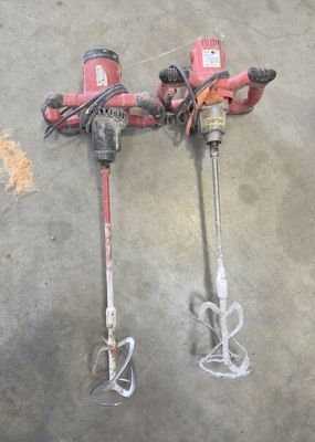 two tools that are laying on the floor
