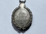 an image of a silver locke with writing on it