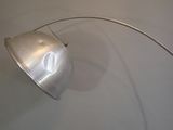 a lamp that is on the wall next to a wall
