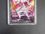 an image of a pokemon card with a picture of a pink and white pony