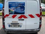 a van that is parked on the side of the road
