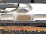 a small metal device that is sitting on top of a box
