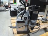 a machine that is sitting on a pallet in a warehouse