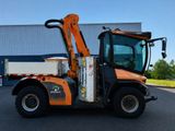 a picture of a forklift truck parked in front of a building