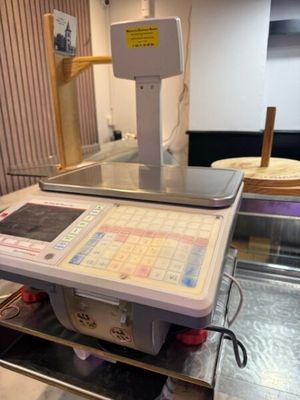 a machine that is sitting on the counter in the kitchen