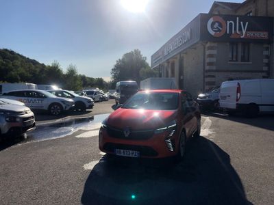 a red car that is parked in a parking lot