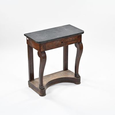 Console en acajou en placage d'acajou, elle ouvre par un tir…