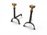 pair of antique brass candlesticks on cast iron bases