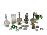 a lot of glass items that are sitting on a table