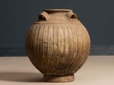 a large vase that is sitting on a table