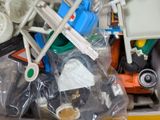 a lot of toys in a plastic bag on the table