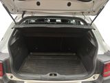 a trunk of a car with the back door open