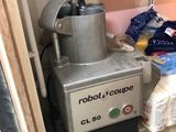 a machine that is sitting on the counter in the kitchen
