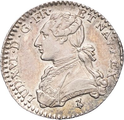 pièce de monnaie en argent portant l'image d'une tête d'homme