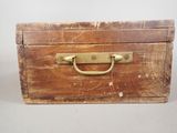 a small wooden box with a handle on it