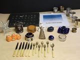 a table with silverware and silverware on it