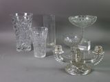 a lot of glass items that are sitting on a table
