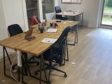 a room with a table and chairs in it