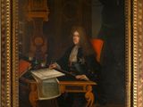 tableau représentant un homme assis à un bureau avec un livre