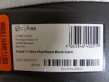 a close up of a label on a black suitcase
