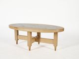 a wooden table with a marble top on a white background