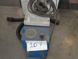 a machine that is sitting on the floor with a price tag