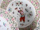 a plate with a picture of a man and a woman on it