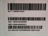 a close up of a bar code on the back of a refrigerator