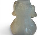 a glass vase that has a bow on it