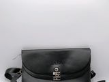 a black leather cross body bag on a white background