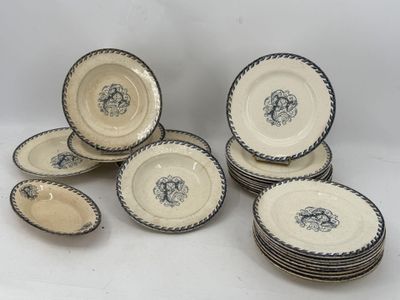 six pieces of blue and white dinner plates with a black and white design