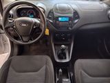 the interior of a car with a steering wheel and dashboard controls