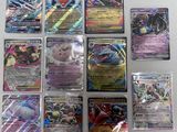 the pokemon cards are lined up on the table ready to be played