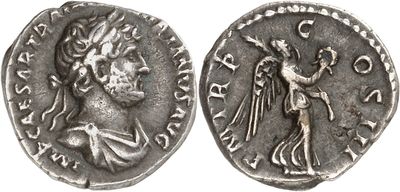 a silver coin with an image of a man holding a sword