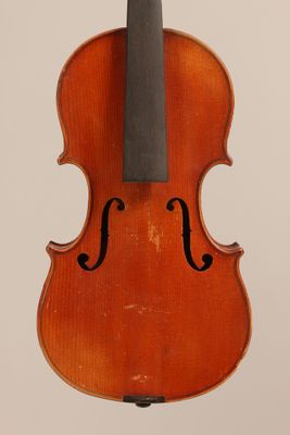 an old violin with a bow on a white background