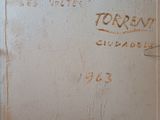 an old book with writing on it sitting on a table