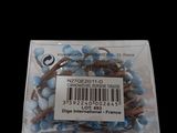 a package of blue and brown beads on a black background