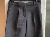 a close up of a pair of shorts hanging on a wall