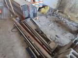 a pile of construction materials sitting on the floor in a room