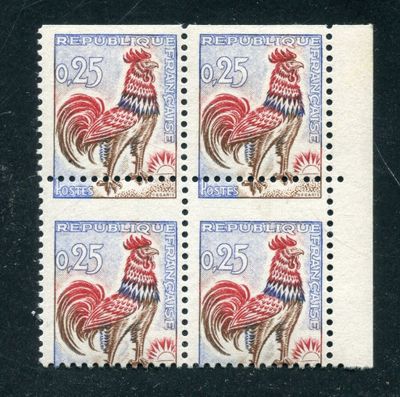 four stamps with roosters on them on a black surface