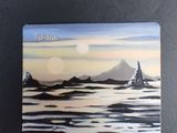 a picture of a painting of a mountain in the ocean