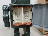 a toy robot that is sitting on a table