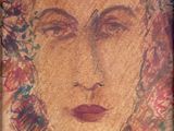 painting of a woman ' s face on a piece of paper with writing on it