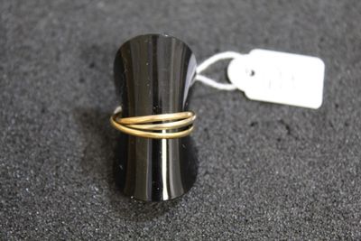 an image of a ring with a tag attached to it
