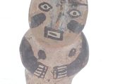 an image of a clay figurine of a man