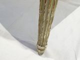 an image of a close up of a table with a vase on it