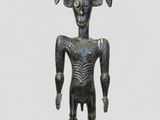 une image représentant une statue d'un homme avec des cornes sur la tête
