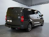 a picture of a black van parked in a garage