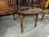 a wooden chair that is sitting in a room