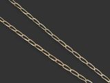 a gold chain with a heart pendant on a black background